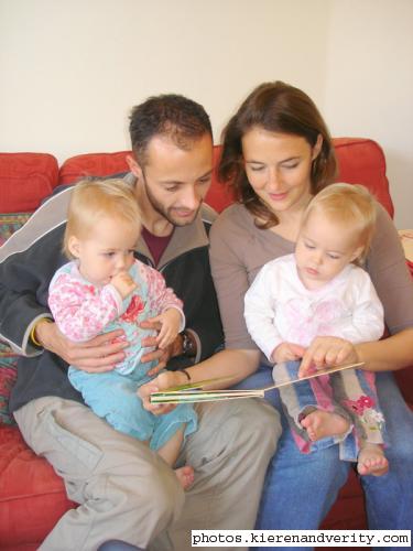 Kieren with Holly and Verity with Bethany reading a book