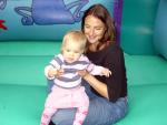 Verity with Bethany on the bouncy castle