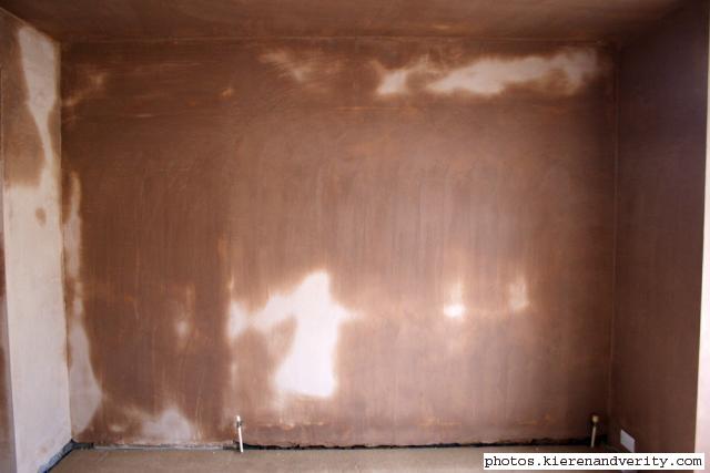 sofa wall after day 3 of plastering