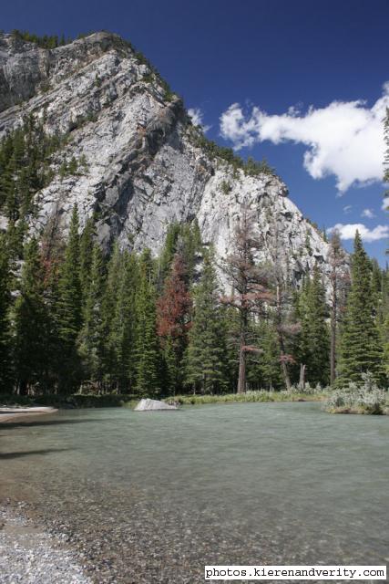 mountain by river
