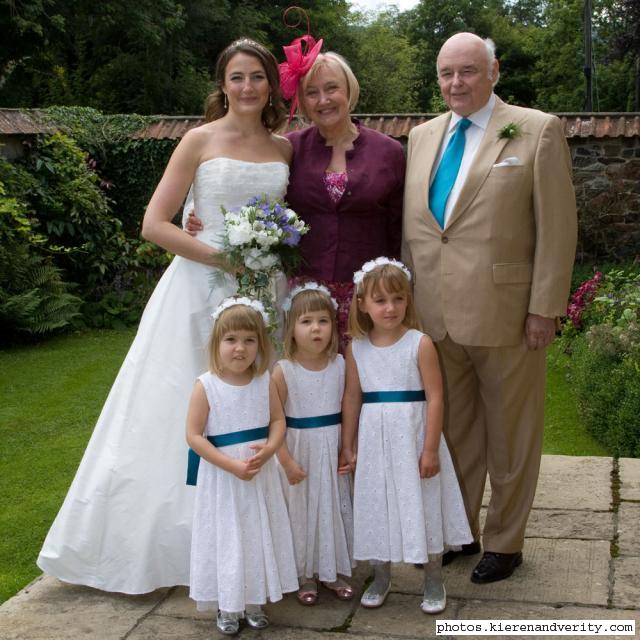 Verity with her parents and the small bridesmaids - Holly, Bethany and Amy