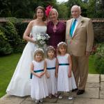 Verity with her parents and the small bridesmaids - Holly, Bethany and Amy